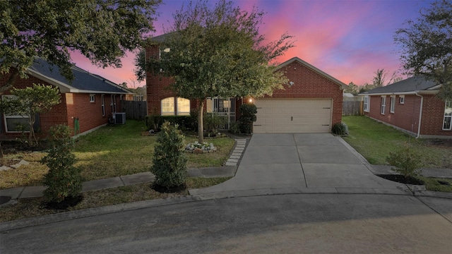 view of front of property featuring driveway, a garage, brick siding, cooling unit, and a front lawn