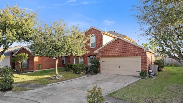 traditional-style house featuring an attached garage, concrete driveway, a front lawn, and brick siding