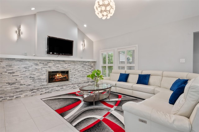 tiled living area featuring recessed lighting, a stone fireplace, and lofted ceiling