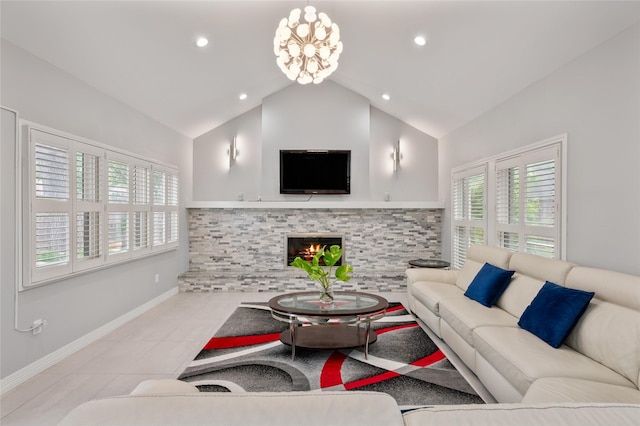 living area with recessed lighting, baseboards, light tile patterned floors, a tile fireplace, and vaulted ceiling