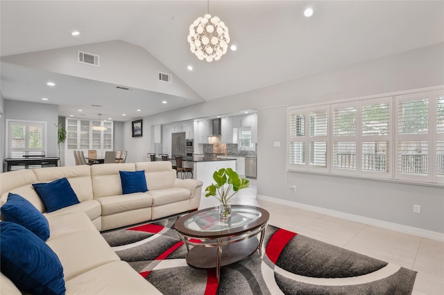 living room featuring lofted ceiling, recessed lighting, light tile patterned flooring, and visible vents
