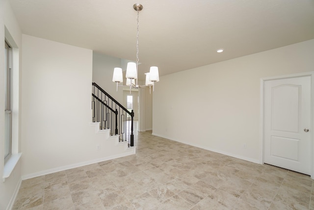 interior space with recessed lighting, baseboards, a chandelier, and stairway