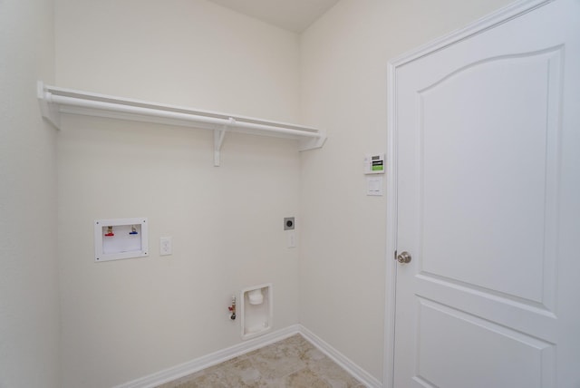 laundry area with washer hookup, laundry area, baseboards, electric dryer hookup, and hookup for a gas dryer