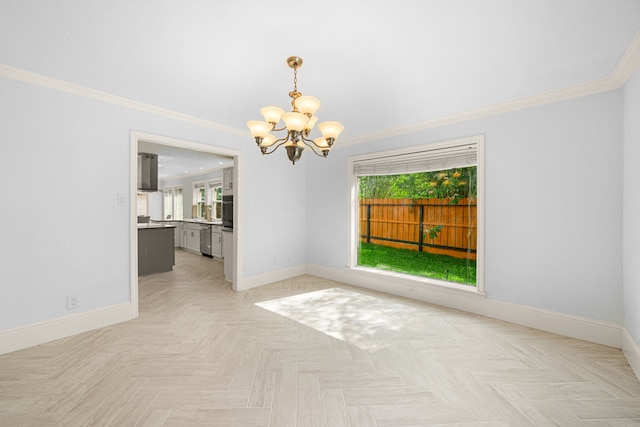 unfurnished room with baseboards, a notable chandelier, and plenty of natural light