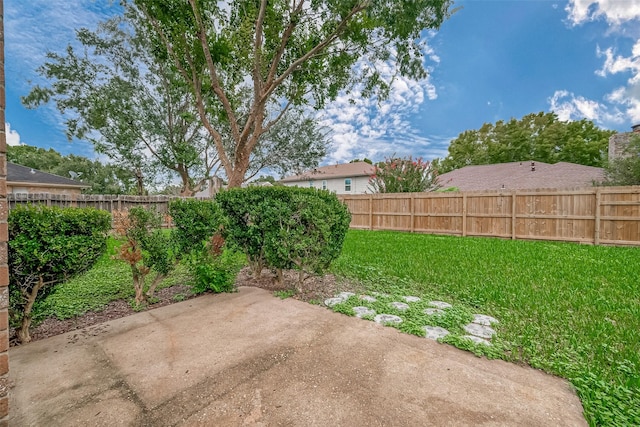 3022 Sam Houston Dr, Sugar Land, TX 77479 - fenced backyard featuring a patio