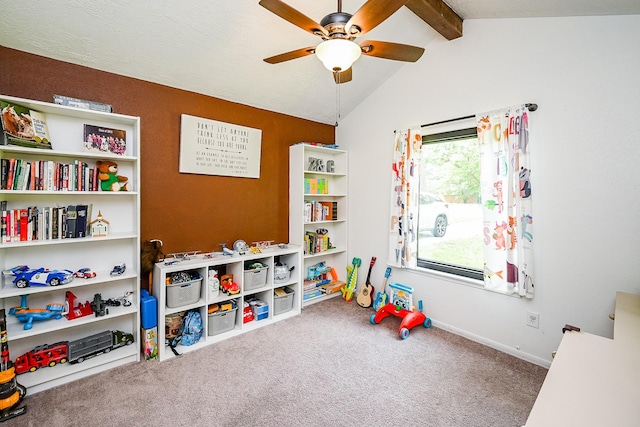 rec room featuring baseboards, ceiling fan, lofted ceiling with beams, and carpet flooring