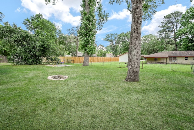 view of yard featuring fence