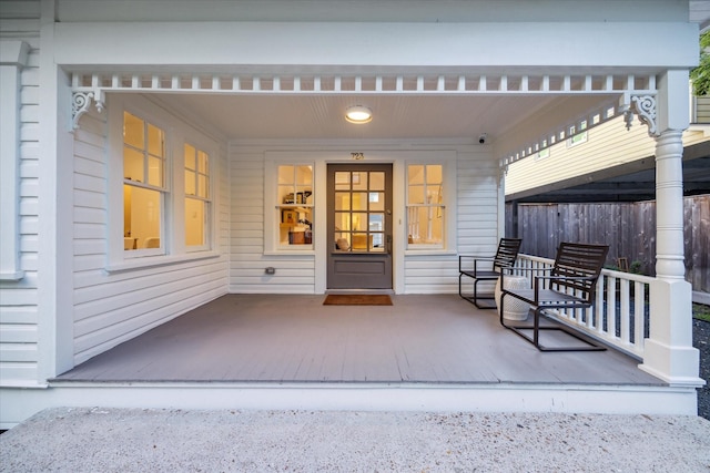 property entrance with covered porch