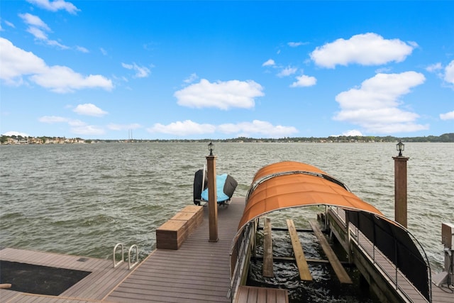 view of dock with a water view