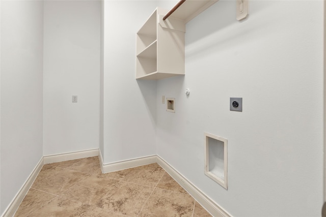 laundry room featuring gas dryer hookup, hookup for an electric dryer, laundry area, baseboards, and hookup for a washing machine