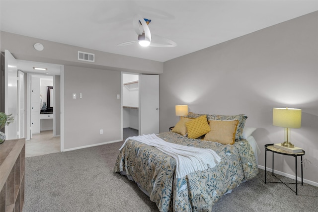 bedroom featuring visible vents, carpet flooring, baseboards, and ceiling fan