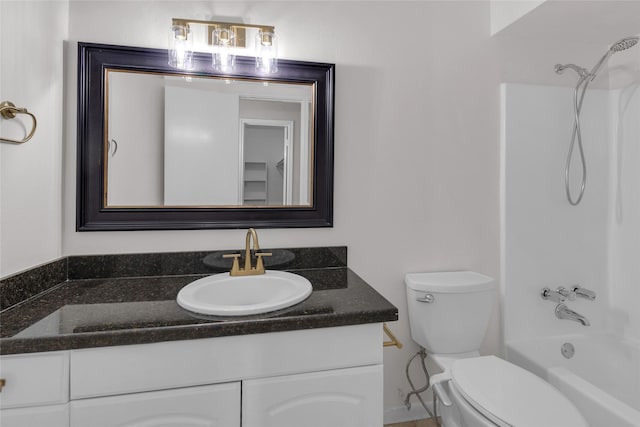 full bath with vanity, toilet, and bathing tub / shower combination