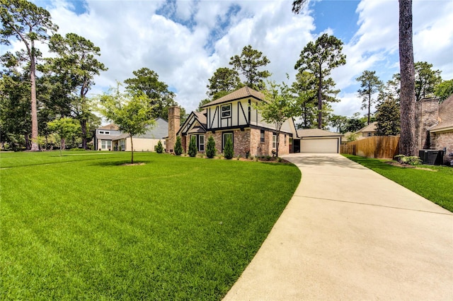 17522 Sorrel Ridge Dr, Spring, TX 77388 - english style home with brick siding, central AC, concrete driveway, a garage, and stucco siding