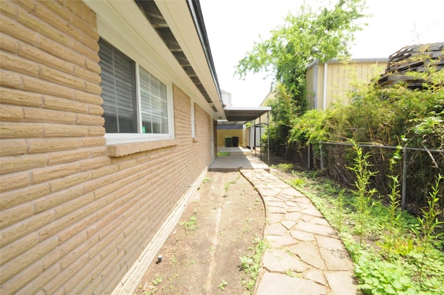 1246 W 21st St, Houston, TX 77008 - view of side of home featuring fence and a shed