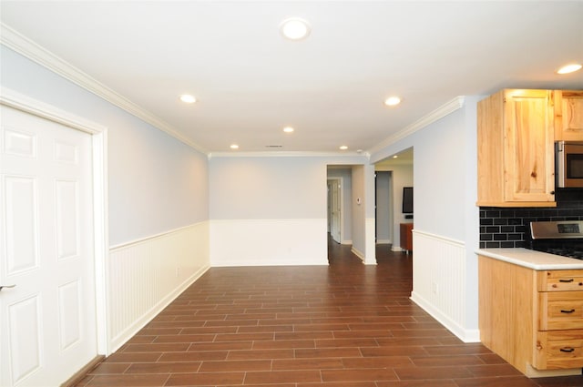 1246 W 21st St, Houston, TX 77008 - kitchen with recessed lighting, appliances with stainless steel finishes, wainscoting, light brown cabinets, and light countertops