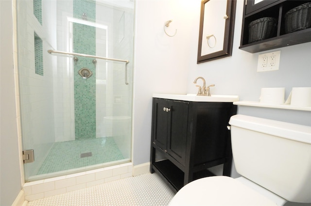 1246 W 21st St, Houston, TX 77008 - bathroom with toilet, a stall shower, baseboards, and tile patterned floors