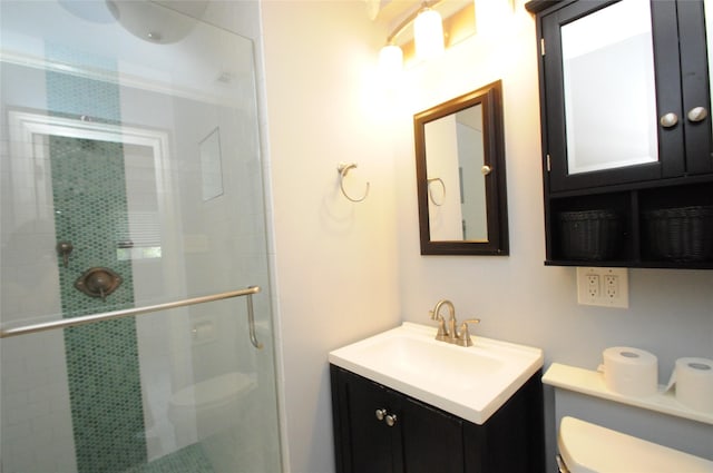 1246 W 21st St, Houston, TX 77008 - bathroom featuring toilet, a stall shower, and vanity