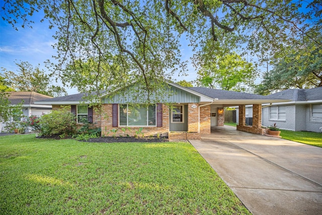 ranch-style house featuring an attached carport, a front lawn, and brick siding