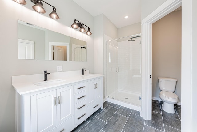 full bathroom with visible vents, a sink, double vanity, and a shower stall