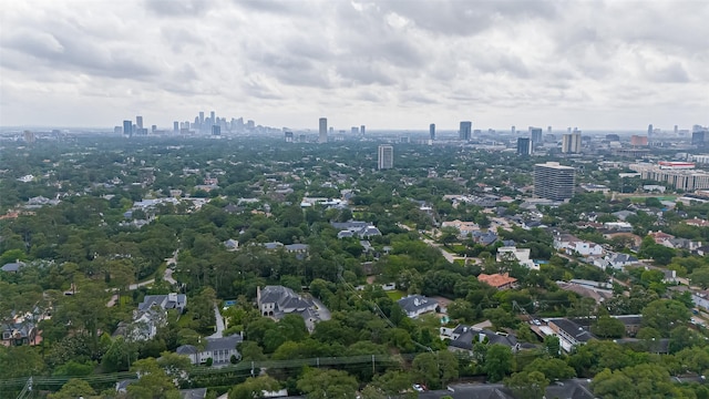 birds eye view of property featuring a city view