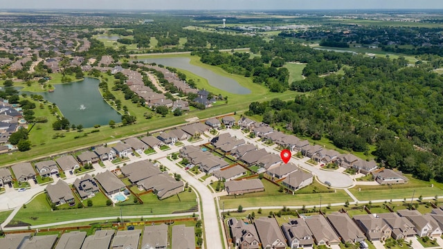 aerial view featuring a water view and a residential view