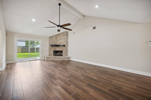 unfurnished living room with ceiling fan, dark wood-type flooring, beam ceiling, and visible vents
