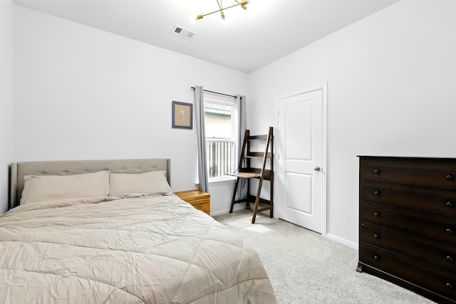 bedroom with carpet flooring, baseboards, and visible vents
