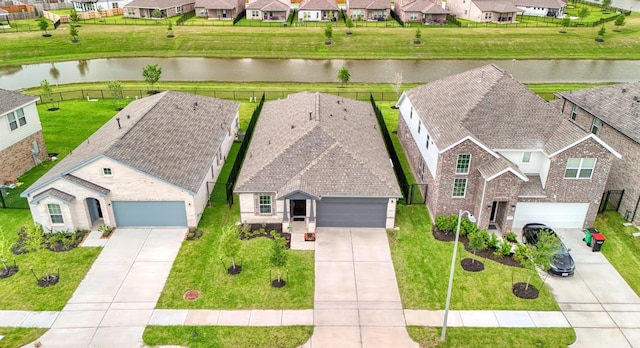 15219 Faushard Ln, Houston, TX 77044 - aerial perspective of suburban area featuring a nearby body of water