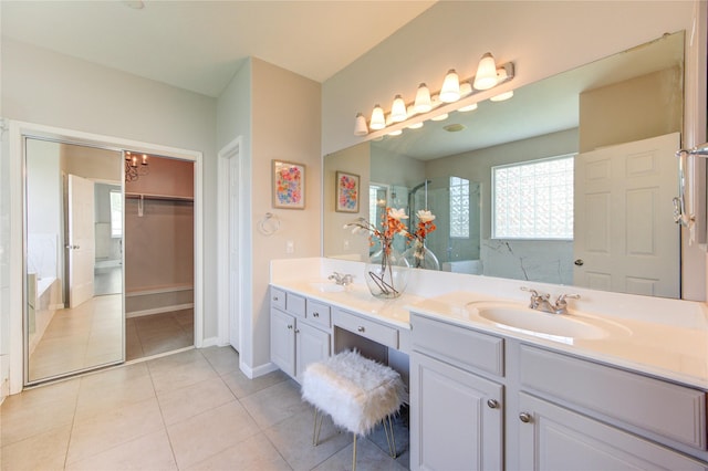 7206 Fountain Mdw, Katy, TX 77494 - bathroom featuring a sink, tile patterned floors, walk in shower, and double vanity