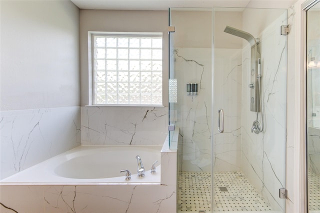 7206 Fountain Mdw, Katy, TX 77494 - bathroom with plenty of natural light, a marble finish shower, and a bath