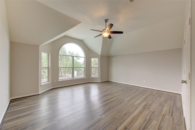 7206 Fountain Mdw, Katy, TX 77494 - interior space with baseboards, ceiling fan, wood finished floors, and lofted ceiling
