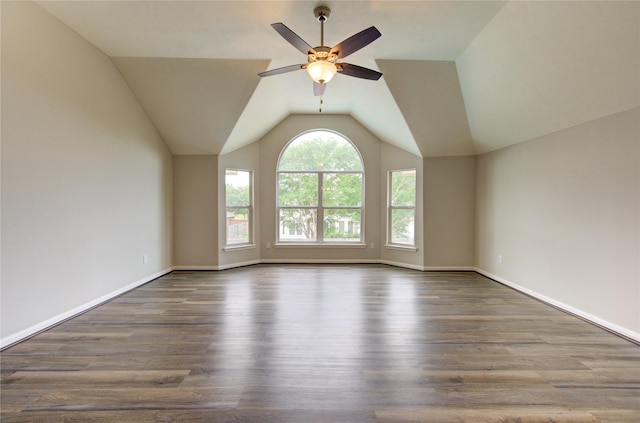 7206 Fountain Mdw, Katy, TX 77494 - unfurnished room featuring baseboards, ceiling fan, wood finished floors, and vaulted ceiling