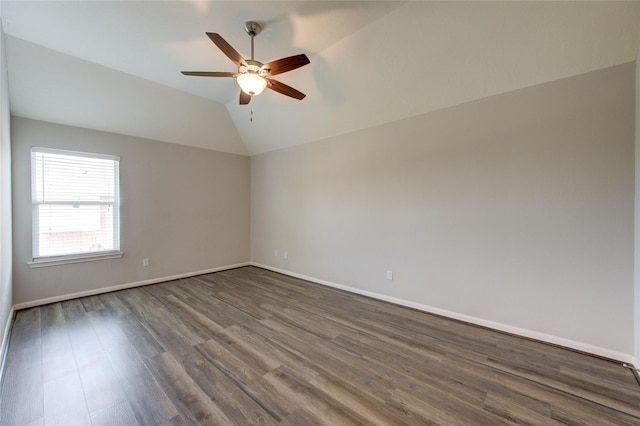 7206 Fountain Mdw, Katy, TX 77494 - spare room with baseboards, ceiling fan, vaulted ceiling, and dark wood-type flooring