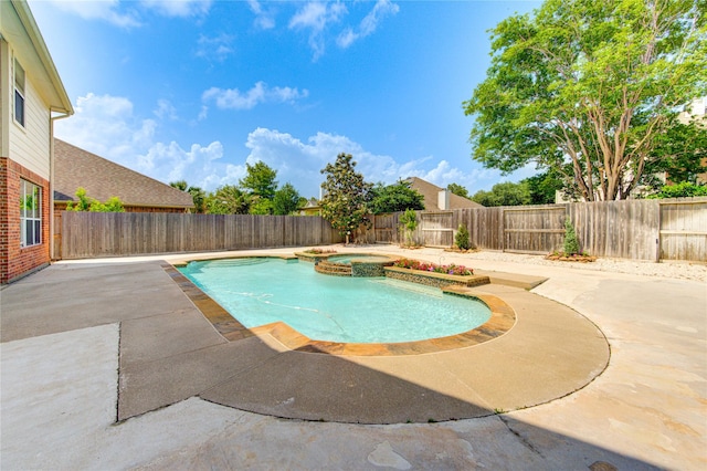 7206 Fountain Mdw, Katy, TX 77494 - view of swimming pool with a fenced backyard, a patio, and a pool with connected hot tub