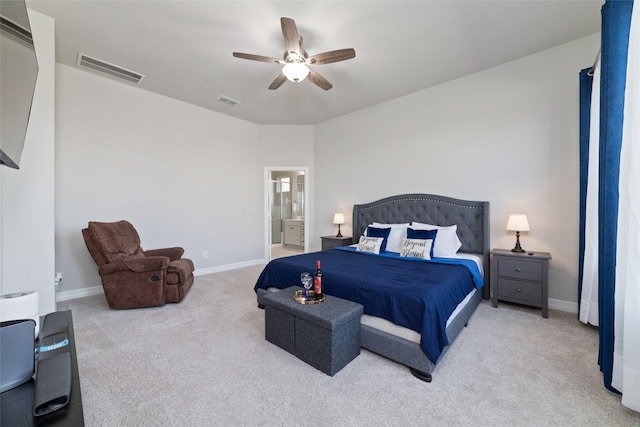 3040 Cirrus Heights Ct, Katy, TX 77493 - carpeted bedroom featuring baseboards, connected bathroom, and ceiling fan