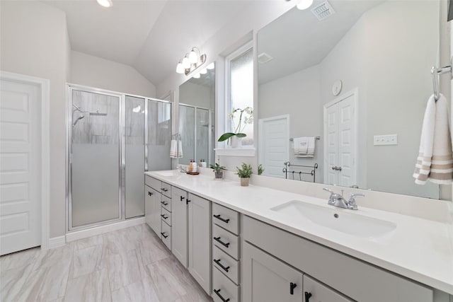 3040 Cirrus Heights Ct, Katy, TX 77493 - full bath featuring a shower stall, marble look tiles, vaulted ceiling, and double vanity