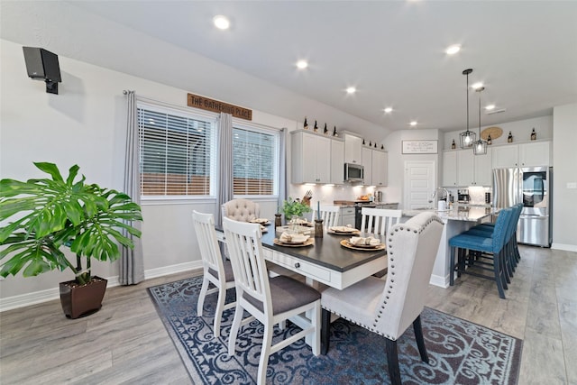 3040 Cirrus Heights Ct, Katy, TX 77493 - dining space featuring light wood-style floors, baseboards, and recessed lighting