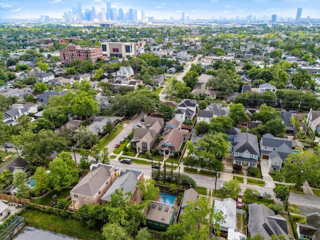 birds eye view of property featuring a city view