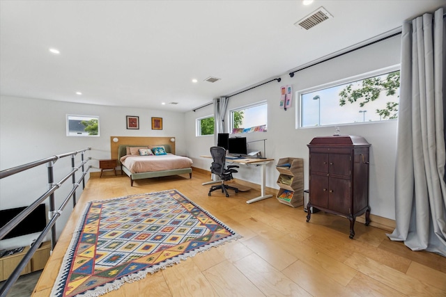 bedroom with recessed lighting, visible vents, and light wood-type flooring