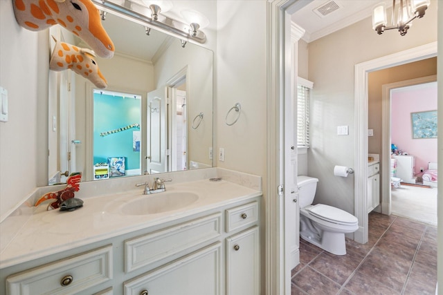 bathroom with crown molding, visible vents, vanity, toilet, and connected bathroom