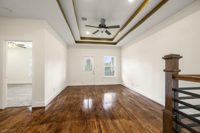 4610 Cashel Glen Dr, Houston, TX 77069 - foyer entrance featuring visible vents, wood finished floors, baseboards, ceiling fan, and a raised ceiling