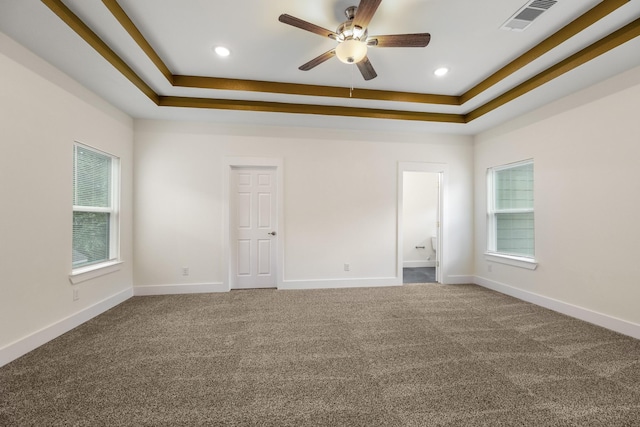 4610 Cashel Glen Dr, Houston, TX 77069 - carpeted empty room featuring a ceiling fan, a tray ceiling, visible vents, and baseboards