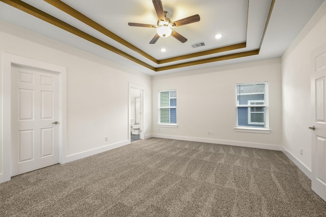 4610 Cashel Glen Dr, Houston, TX 77069 - empty room with carpet floors, ceiling fan, a tray ceiling, and visible vents