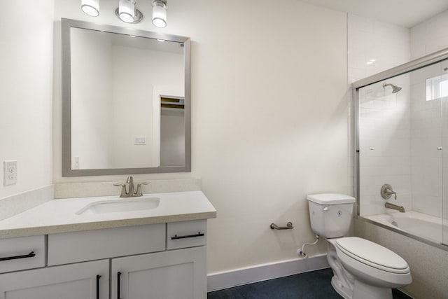 4610 Cashel Glen Dr, Houston, TX 77069 - bathroom with vanity, baseboards, toilet, and shower / bath combination with glass door