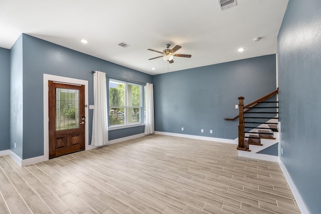 4610 Cashel Glen Dr, Houston, TX 77069 - entrance foyer with a ceiling fan, baseboards, visible vents, and light wood-type flooring