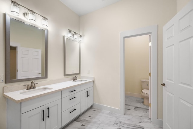 4610 Cashel Glen Dr, Houston, TX 77069 - bathroom with a sink, baseboards, toilet, and marble finish floor