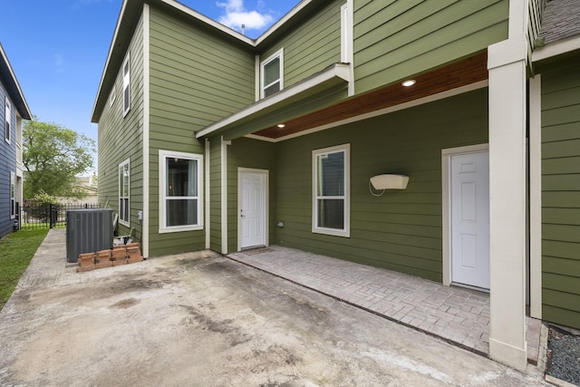 4610 Cashel Glen Dr, Houston, TX 77069 - rear view of property with fence, cooling unit, and a patio area