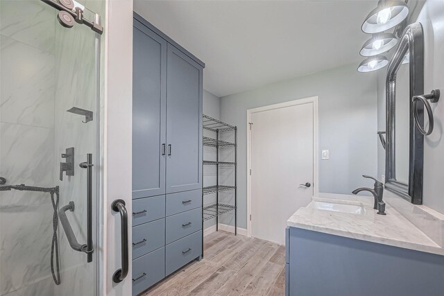16506 Amcreek Rd, Houston, TX 77068 - full bathroom featuring a shower stall, wood finished floors, and vanity