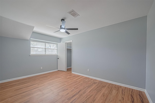 16506 Amcreek Rd, Houston, TX 77068 - unfurnished bedroom with visible vents, a closet, light wood-style floors, baseboards, and a ceiling fan