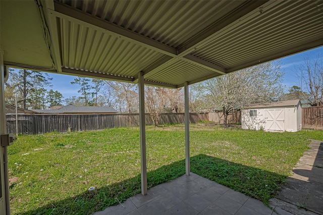 16506 Amcreek Rd, Houston, TX 77068 - view of yard with a patio, a fenced backyard, a shed, and an outbuilding